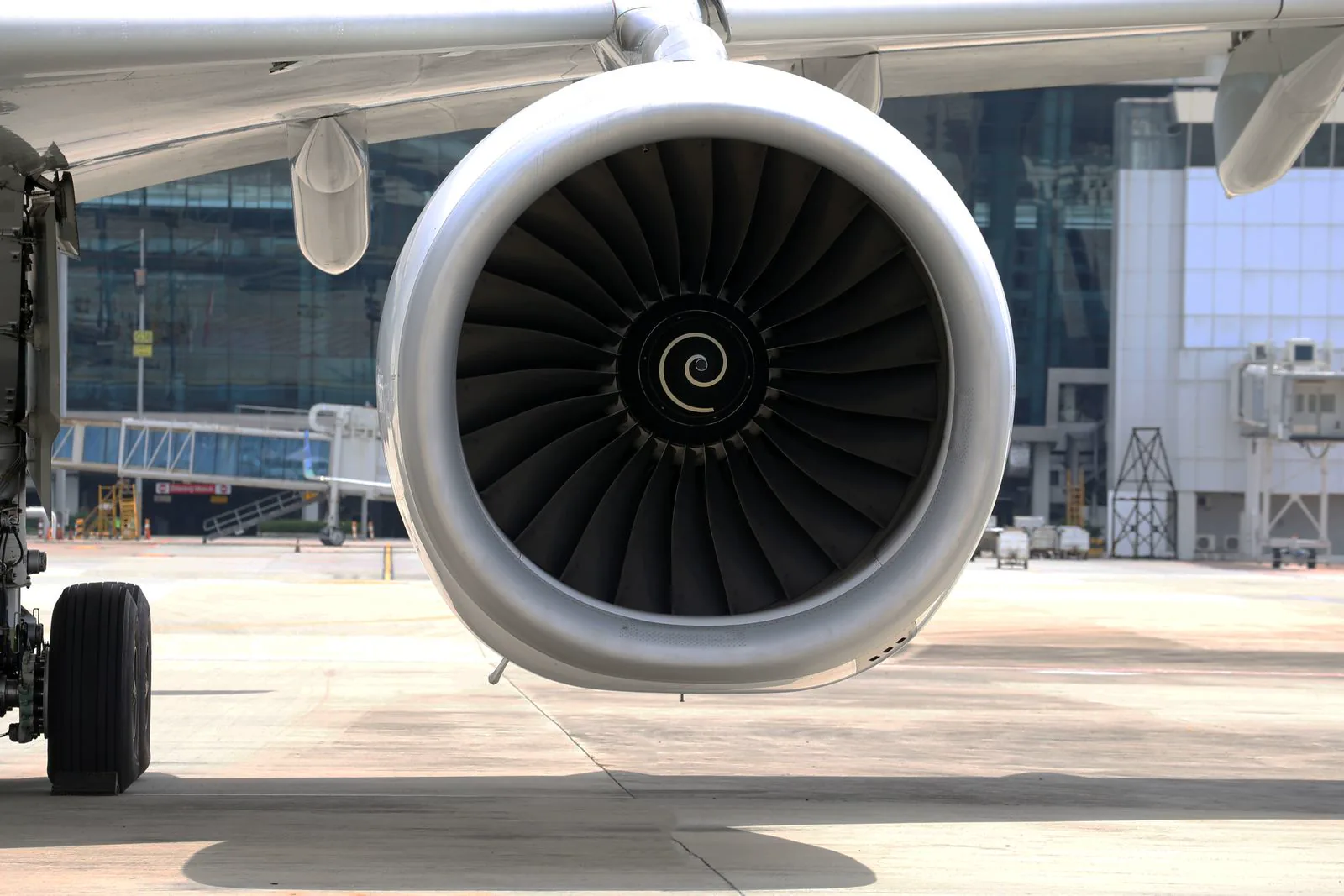 An aircraft jet engine on a stand during ground handling.